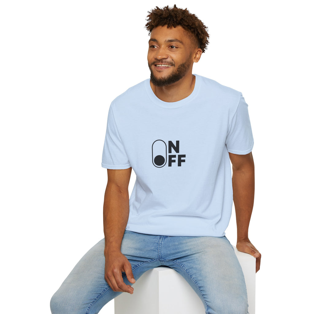 Man wearing a light blue On/Off graphic T-shirt with jeans, seated against a white background.