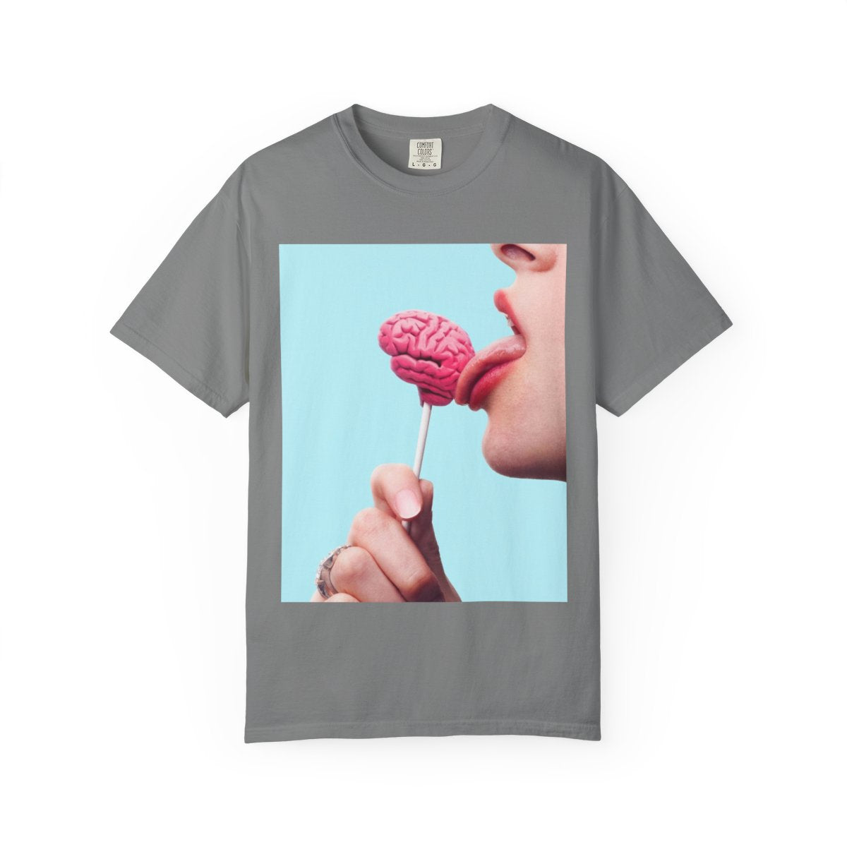 Lickin Brain T-Shirt in Grey with a surreal print of a tongue licking a pink brain lollipop against a turquoise background.